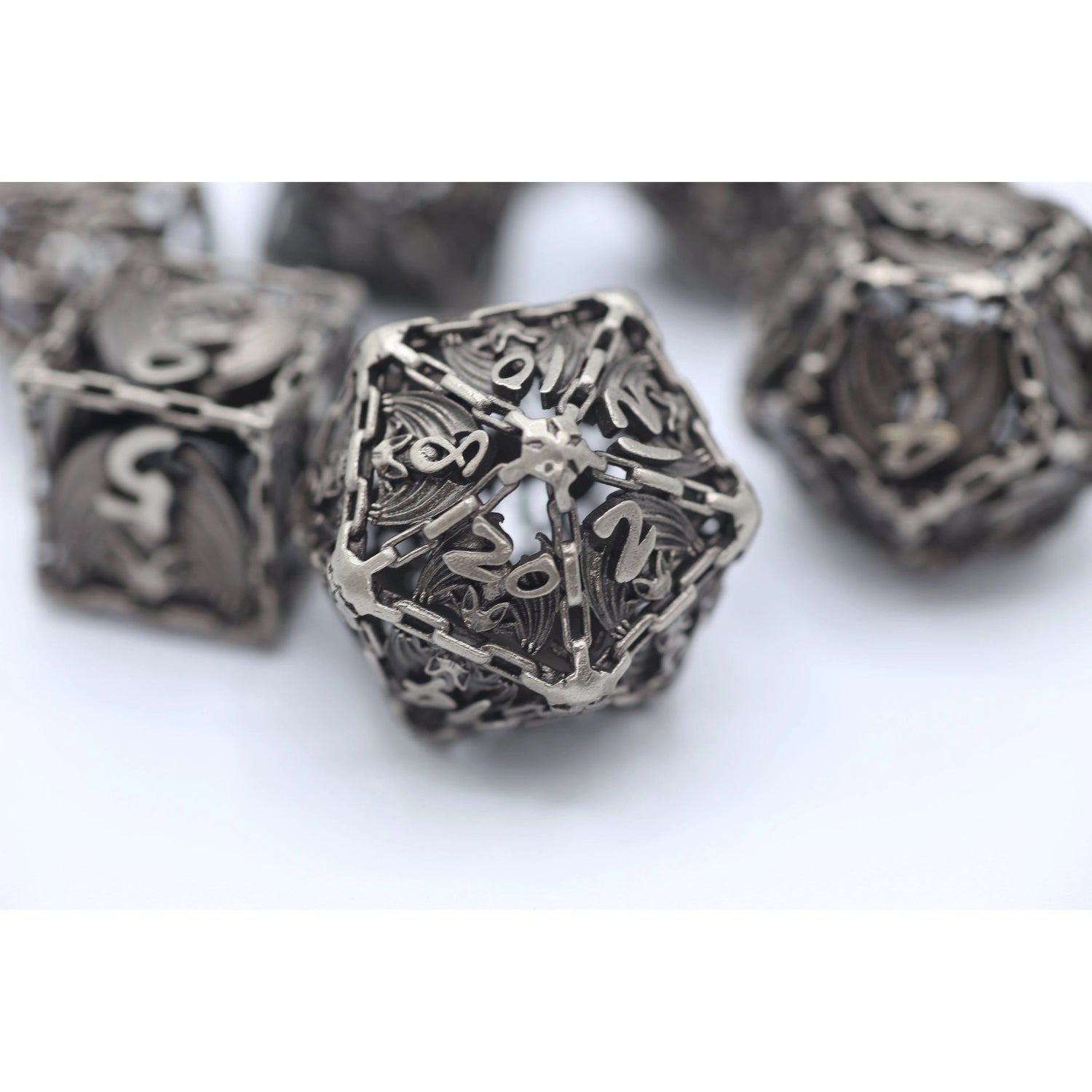 Ancient Silver Hollow Metal Bat Polyhedral Dice Set